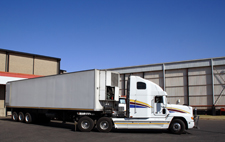 Single semi truck at a distribution goods warehouse