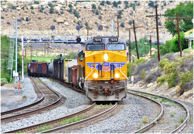 Special Permits and Authority Approvals can impact every type of hazardous material in every type of transport mode—like this Union Pacific Railroad mixed freight train negotiating the sharp mountain curves in the village of Helper, Utah on July 28th, 2014. (© Paul Burgess 2014, used w/permission)